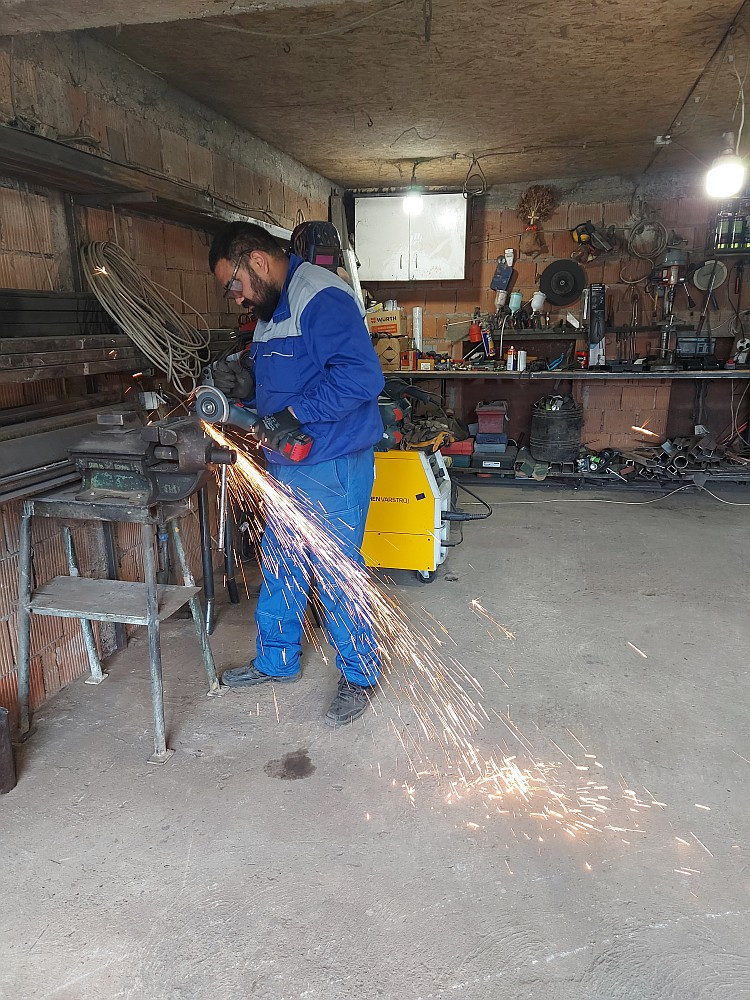 Ilija Stojanov in his workshop working